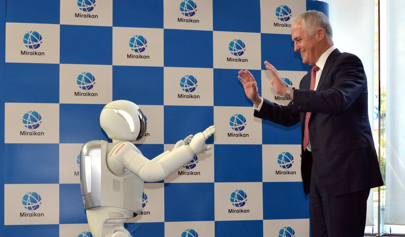 Illustration for article titled With a Handshake and Selfie, Another World Leader Surrenders to the Robots